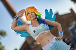 Size: 1080x709 | Tagged: safe, imported from derpibooru, rainbow dash, human, belly button, clothes, cosplay, costume, hand on hip, irl, irl human, photo, salute