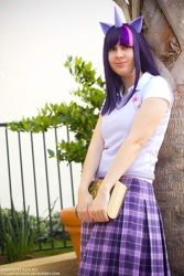 Size: 533x800 | Tagged: safe, artist:twinklebatcosplay, imported from derpibooru, twilight sparkle, human, book, clothes, cosplay, costume, cutie mark on clothes, irl, irl human, photo