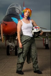 Size: 903x1350 | Tagged: safe, imported from derpibooru, rainbow dash, human, bare shoulders, breasts, clothes, cosplay, costume, female, helmet, irl, irl human, jet, multicolored hair, photo, rainbow hair, sleeveless, solo, standing, tanktop
