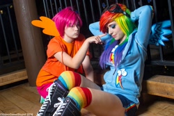 Size: 2048x1365 | Tagged: safe, artist:cosplayhazard, artist:meotashie, artist:videogamestupid, imported from derpibooru, rainbow dash, scootaloo, human, arm behind head, clothes, converse, cosplay, costume, cutie mark on clothes, duo, goggles, irl, irl human, katsucon, katsucon 2016, multicolored hair, photo, rainbow hair, rainbow socks, shoes, socks, striped socks