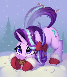 Size: 2026x2324 | Tagged: safe, artist:taneysha, imported from derpibooru, starlight glimmer, pony, unicorn, behaving like a dog, booties, bow, candy, candy cane, cheek fluff, christmas, clothes, cookie, cute, ear fluff, face down ass up, female, fir tree, food, glimmerbetes, hair bow, high res, holiday, mare, mouth hold, shoes, smiling, snow, snowfall, solo, tree, winter