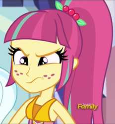 Size: 1002x1080 | Tagged: safe, imported from derpibooru, screencap, sour sweet, sugarcoat, dance magic, equestria girls, spoiler:eqg specials, :s, annoyed, cropped, discovery family, discovery family logo, female, freckles, logo, offscreen character, ponytail, sleeveless, sour sweet is not amused, wavy mouth