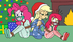 Size: 1648x949 | Tagged: safe, artist:bugssonicx, imported from derpibooru, apple bloom, applejack, pinkie pie, equestria girls, angry, apple sisters, arm behind back, bondage, bound and gagged, bow, brother and sister, christmas, christmas eve, christmas lights, christmas presents, christmas tree, cloth gag, clothes, cousins, emanata, female, fireplace, footed sleeper, footie pajamas, gag, gift wrapped, happy bondage, happy holidays, hat, hearth's warming eve, help us, holiday, living room, onesie, over the nose gag, pajamas, present, related, ribbon, rope, rope bondage, santa hat, siblings, sister, sisters, sticker, tape, tape gag, tied up, tree