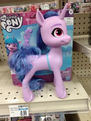 Size: 3120x4160 | Tagged: safe, imported from derpibooru, izzy moonbow, pony, unicorn, comb, cvs pharmacy, g5, high res, irl, looking at you, merchandise, my little pony logo, my little pony: a new generation, photo, price tag, solo, toy