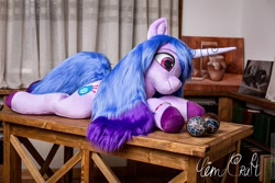 Size: 1140x760 | Tagged: safe, artist:limecraft, imported from derpibooru, izzy moonbow, pony, unicorn, female, g5, irl, life size, mare, my little pony: a new generation, photo, plushie, solo