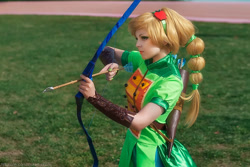 Size: 1200x803 | Tagged: safe, artist:bizarre-deer, imported from derpibooru, applejack, human, equestria girls, friendship games, 2017, arrow, bow (weapon), bow and arrow, clothes, cosplay, costume, irl, irl human, photo, weapon