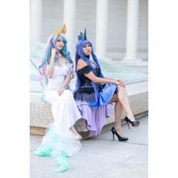 Size: 1080x1080 | Tagged: safe, imported from derpibooru, princess celestia, princess luna, human, clothes, cosplay, costume, crossed legs, dress, duo, high heels, irl, irl human, photo, royal sisters, shoes, siblings, sisters, sitting