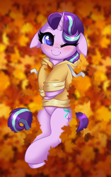 Size: 2580x4100 | Tagged: safe, alternate version, artist:confetticakez, imported from derpibooru, starlight glimmer, pony, unicorn, alternate character, autumn, autumn leaves, blushing, c:, clothes, commission, cute, female, floppy ears, glimmerbetes, hoodie, leaf, leaves, lying down, mare, on back, one eye closed, patreon, patreon reward, smiling, solo, wink