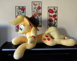 Size: 1140x904 | Tagged: safe, artist:purplenebulastudios, imported from derpibooru, applejack, pony, irl, life size, lying down, photo, plushie, prone, solo