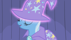 Size: 1920x1080 | Tagged: safe, imported from derpibooru, screencap, trixie, pony, unicorn, boast busters, cape, clothes, eyes closed, female, hat, levitation, magic, magic aura, mare, open mouth, solo, telekinesis, trixie's cape, trixie's hat