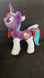 Size: 280x496 | Tagged: artist needed, safe, imported from derpibooru, oc, oc only, oc:cosmic spark, pony, unicorn, clothes, comments locked down, horn, plushie, socks, solo, unicorn oc