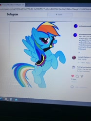 Size: 1530x2048 | Tagged: safe, artist:princessmoondust2008, imported from derpibooru, screencap, rainbow dash, pegasus, pony, clothes, cosplay, costume, implied sylvia, instagram, photo, picture of a screen, saddle, solo, tack, wander over yonder