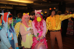 Size: 1200x800 | Tagged: safe, imported from derpibooru, angel bunny, cheese sandwich, fluttershy, pinkie pie, rainbow dash, human, balloon, carrot, clothes, cosplay, costume, food, hearth's warming con, hearth's warming con 2015, irl, irl human, photo