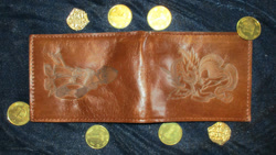 Size: 1024x577 | Tagged: safe, alternate version, artist:malte279, imported from derpibooru, part of a set, princess celestia, griffon, coin, craft, fantasy class, leather, pyrography, traditional art, wallet, warrior