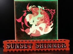 Size: 2805x2065 | Tagged: safe, artist:themisto97, imported from derpibooru, sunset shimmer, pony, unicorn, acrylic plastic, acrylight, catasterism, craft, engraving, evil grin, female, fiery shimmer, fire, fire tail, fireball, grin, lasercut, led, mane of fire, mare, multicolored, nightlight, photo, raised hoof, rapidash shimmer, smiling, smirk, solo, sun, tail of fire, text