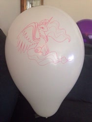 Size: 600x800 | Tagged: artist needed, safe, imported from derpibooru, princess celestia, alicorn, pony, balloon, irl, lidded eyes, photo, sitting, solo, spread wings, wings