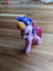 Size: 3024x4032 | Tagged: safe, imported from derpibooru, izzy moonbow, unicorn, ball, bootleg, bootleg lego, female, g5, horn, horn guard, hornball, irl, lego, mare, photo, solo, tennis ball, toy