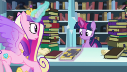 Size: 1280x720 | Tagged: safe, imported from derpibooru, screencap, princess cadance, twilight sparkle, alicorn, pony, the crystalling, book, bookshelf, crown, crystal empire, duo, duo female, female, flying, glowing horn, horn, jewelry, library, magic, magic aura, mare, regalia, sisters-in-law, telekinesis, twilight sparkle (alicorn)