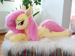 Size: 3024x2268 | Tagged: safe, artist:epicrainbowcrafts, imported from derpibooru, fluttershy, bat pony, pony, bat ponified, bedroom eyes, flutterbat, irl, lying down, photo, plushie, prone, race swap, solo