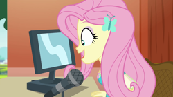 Size: 1280x720 | Tagged: safe, imported from derpibooru, screencap, fluttershy, equestria girls, equestria girls series, fluttershy's butterflies, computer, cute, fluttershy's butterflies: rainbow dash, geode of fauna, hairpin, jewelry, magical geodes, microphone, necklace, open mouth, shyabetes, smiling