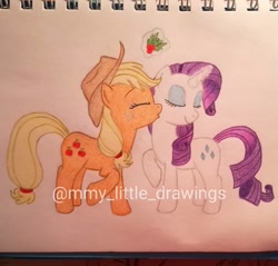 Size: 1080x1033 | Tagged: safe, artist:mmy_little_drawings, imported from derpibooru, applejack, rarity, earth pony, pony, unicorn, cheek kiss, eyelashes, eyes closed, female, freckles, glowing horn, hat, holly, holly mistaken for mistletoe, horn, kiss on the cheek, kissing, lesbian, magic, mare, raised hoof, rarijack, shipping, telekinesis, traditional art, watermark
