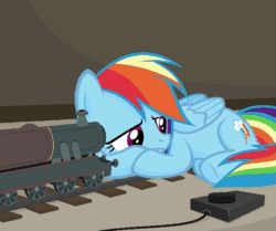 Size: 639x533 | Tagged: safe, imported from ponybooru, screencap, rainbow dash, pegasus, pony, animated, button, controller, depressed, laying on stomach, model train, pushing, ramming, sad, solo, toy, toy train, train, train tracks, trainbow dash