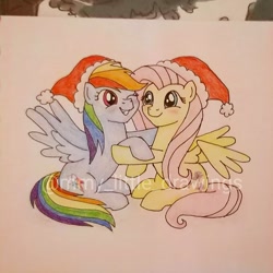 Size: 948x949 | Tagged: safe, artist:mmy_little_drawings, imported from derpibooru, fluttershy, rainbow dash, pegasus, pony, christmas, duo, eyelashes, female, flutterdash, grin, hat, holding hooves, holiday, lesbian, mare, obtrusive watermark, one eye closed, santa hat, shipping, sitting, smiling, traditional art, watermark, wink