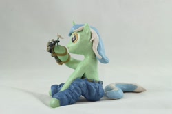 Size: 1280x854 | Tagged: safe, artist:azgchip, imported from derpibooru, lyra heartstrings, pony, unicorn, background pony, clothes, craft, female, flower, hand, jeans, mare, mechanical hands, pants, photo, sculpture, sitting, solo, that pony sure does love hands, that pony sure does love humans, wax