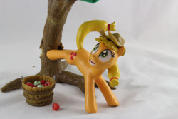 Size: 1280x854 | Tagged: safe, artist:azgchip, imported from derpibooru, applejack, earth pony, pony, accident, apple, apple tree, applebucking, bucket, bucking, craft, faic, falling, female, food, freckles, mare, photo, scared, sculpture, shocked, solo, tree, wax, wide eyes