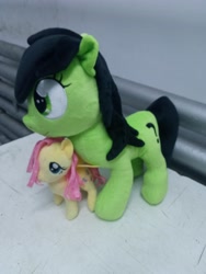 Size: 3120x4160 | Tagged: safe, artist:onlyfactory, imported from derpibooru, fluttershy, oc, oc:filly anon, earth pony, pegasus, pony, bootleg, female, filly, irl, photo, plushie, size difference