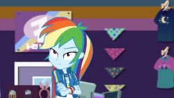 Size: 3410x1920 | Tagged: safe, imported from derpibooru, screencap, rainbow dash, equestria girls, equestria girls series, holidays unwrapped, spoiler:eqg series (season 2), clothes, crossed arms, cutie mark, cutie mark on clothes, dashing through the mall, female, geode of super speed, hoodie, jewelry, looking at you, magical geodes, necklace, solo