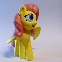 Size: 1279x1279 | Tagged: safe, artist:pessimizer, imported from derpibooru, fluttershy, pegasus, pony, 3d print, figurine, irl, photo, smiling, solo, spread wings, wings