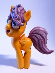 Size: 1125x1500 | Tagged: safe, artist:pessimizer, imported from derpibooru, scootaloo, pegasus, pony, 3d print, cute, cutealoo, female, figurine, filly, happy, irl, jumping, photo, smiling, solo
