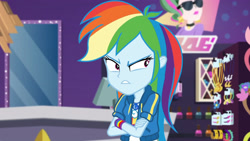 Size: 3410x1920 | Tagged: safe, imported from derpibooru, screencap, rainbow dash, equestria girls, equestria girls series, holidays unwrapped, spoiler:eqg series (season 2), angry, clothes, crossed arms, cutie mark, cutie mark on clothes, dashing through the mall, female, geode of super speed, hoodie, jewelry, magical geodes, necklace, rainbow dash is not amused, solo, unamused
