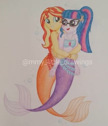 Size: 1079x1260 | Tagged: safe, artist:mmy_little_drawings, imported from derpibooru, sci-twi, sunset shimmer, twilight sparkle, mermaid, equestria girls, bare shoulders, bear hug, bikini, bikini top, blushing, clothes, duo, eyelashes, female, glasses, grin, hug, lesbian, mermaid sci-twi, mermaid tail, mermaidized, open mouth, scitwishimmer, shipping, sleeveless, smiling, species swap, sunsetsparkle, swimsuit, traditional art, watermark