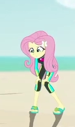 Size: 183x309 | Tagged: safe, imported from derpibooru, screencap, fluttershy, aww... baby turtles, equestria girls, equestria girls series, beach, clothes, cropped, female, fluttershy's wetsuit, ocean, sandals, solo, swimsuit, wetsuit