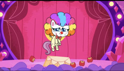 Size: 828x473 | Tagged: safe, imported from derpibooru, screencap, fluttershy, pegasus, pony, lolly-pop, my little pony: pony life, spoiler:pony life s02e19, apple, bowtie, breaking the fourth wall, clown, clown makeup, clown nose, clown wig, cute, female, flutterclown, flying, food, g4.5, pony life, rainbow wig, red nose, shyabetes, solo, stage