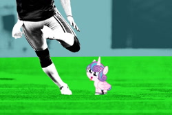 Size: 1200x800 | Tagged: safe, imported from derpibooru, princess flurry heart, human, abuse, american football, flurrybuse, football field, irl, irl human, kicking, op is a duck, photo, punt, sports, tongue out