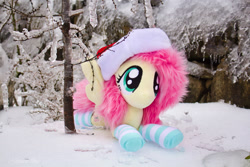 Size: 1800x1200 | Tagged: safe, artist:fluttershyhiker, artist:lanacraft, artist:natureshy, imported from derpibooru, fluttershy, pony, christmas, clothes, hat, holiday, irl, lying down, photo, plushie, prone, santa hat, socks, solo, striped socks