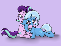 Size: 3368x2540 | Tagged: safe, artist:background basset, imported from derpibooru, starlight glimmer, trixie, pony, unicorn, blushing, duo, duo female, female, high res, holding hooves, hug, lesbian, looking at each other, lying down, mare, pink background, shipping, simple background, smiling, smiling at each other, startrix