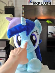 Size: 768x1024 | Tagged: safe, artist:nekokevin, imported from derpibooru, minuette, human, pony, unicorn, boop, chair, computer screen, female, irl, irl human, looking at you, mare, offscreen character, photo, plushie, sitting, smiling, solo, table, underhoof