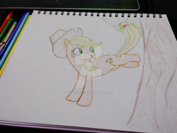 Size: 400x300 | Tagged: safe, artist:dougtheloremaster, imported from derpibooru, applejack, earth pony, pony, applebucking, deviantart watermark, obtrusive watermark, pencil, pencil drawing, photo, sketchpad, traditional art, watermark