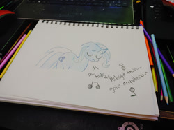 Size: 1280x960 | Tagged: safe, artist:dougtheloremaster, imported from derpibooru, part of a set, trixie, pony, unicorn, don't stop believing, eyes closed, journey, journey (band), part of a series, pencil, pencil drawing, photo, singing, sketchpad, song reference, traditional art