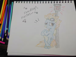 Size: 1280x960 | Tagged: safe, artist:dougtheloremaster, imported from derpibooru, part of a set, spitfire, pegasus, pony, bipedal, clothes, crossed arms, don't stop believing, journey, journey (band), lamppost, part of a series, pencil, pencil drawing, photo, singing, sketchpad, song reference, traditional art, uniform, wonderbolts uniform