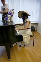 Size: 1067x1600 | Tagged: safe, imported from derpibooru, rarity, human, 2021, clothes, cosplay, costume, cyrillic, irl, irl human, musical instrument, newbronycon, photo, piano, plushie, rubronycon, russian