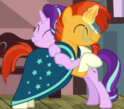 Size: 553x489 | Tagged: safe, imported from derpibooru, screencap, starlight glimmer, sunburst, pony, unicorn, uncommon bond, blaze (coat marking), coat markings, cropped, duo, eyes closed, facial markings, female, hug, magic, magic aura, male, mare, socks (coat markings), stallion