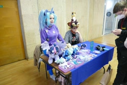 Size: 1600x1067 | Tagged: safe, imported from derpibooru, trixie, twilight sparkle, human, 2021, clothes, cosplay, costume, cyrillic, irl, irl human, newbronycon, photo, plushie, rubronycon, russian