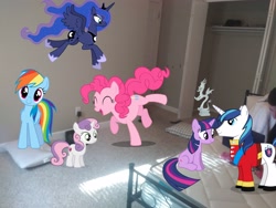 Size: 4160x3120 | Tagged: safe, imported from derpibooru, discord, pinkie pie, princess luna, rainbow dash, shining armor, sweetie belle, twilight sparkle, alicorn, earth pony, pegasus, pony, unicorn, ^^, eyes closed, female, flying, high res, irl, looking at you, male, mare, open mouth, open smile, photo, ponies in real life, sitting, smiling, smiling at you, stallion, statue, statue discord, unicorn twilight