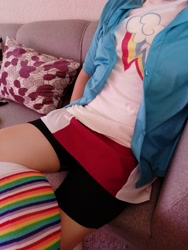 Size: 3456x4608 | Tagged: safe, imported from derpibooru, photographer:mrsparkle89, rainbow dash, human, bike shorts, clothes, cosplay, costume, crossdressing, crossplay, cutie mark, irl, irl human, legs, photo, pictures of legs, rainbow socks, sitting, skirt, socks, striped socks