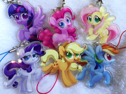 Size: 1280x960 | Tagged: safe, artist:dawnfire, imported from twibooru, applejack, fluttershy, pinkie pie, rainbow dash, rarity, twilight sparkle, charm, irl, keychain, mane six, paywalled source, photo, smiling